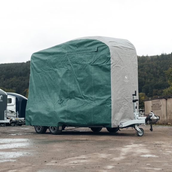 Durable horsebox cover to protect your trailer from weather and dirt, made from high-quality materials for long-lasting outdoor use, easy to fit and remove.