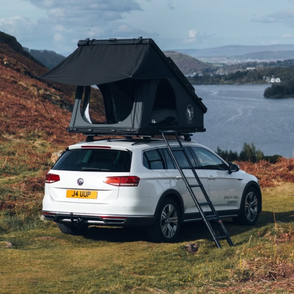 Durable roof tent for VW vehicles with custom covers, ideal for outdoor camping adventures and roof rack protection. Designed for stability, weather resistance, and ease of setup.