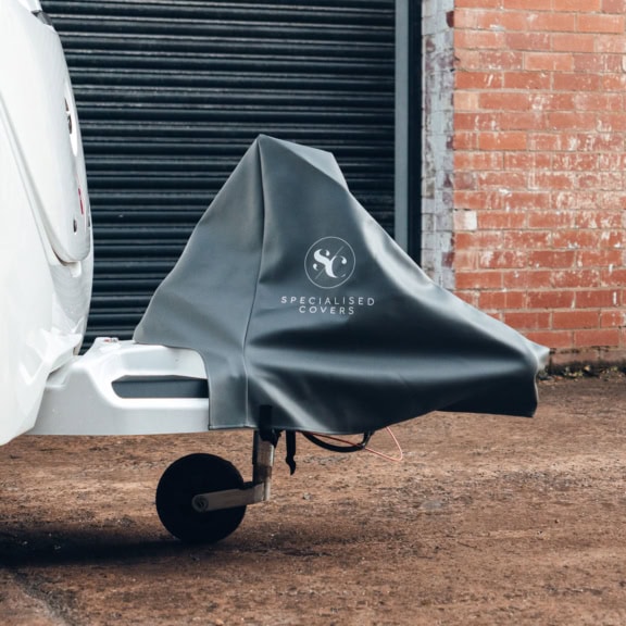 A picture of an A-Frame Cover + fitting to a caravan.