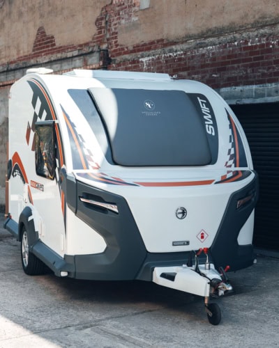 High-quality custom camper cover for Basecamp Elite, protecting your travel trailer from weather and dust. Perfect for outdoor storage, durable materials, and tailored fit.