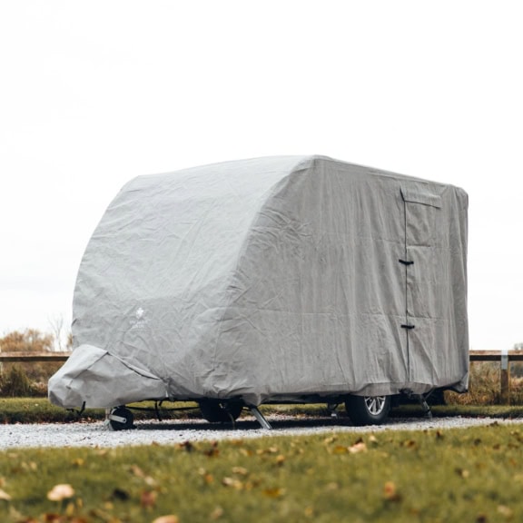 Durable caravan cover for weather protection and long-lasting outdoor use. Custom-fit design ensures a snug fit for all caravan sizes, shielding against rain, snow, and UV damage. Easy to install and remove.