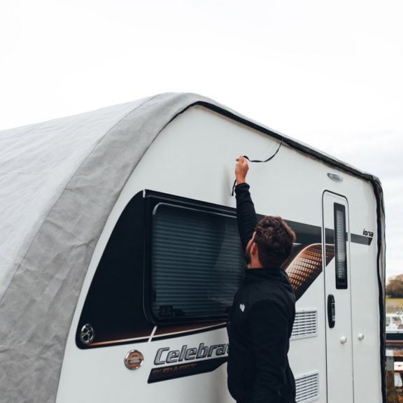 Premium caravan cover for outdoor protection against weather, dirt, and UV damage. Custom-fit and durable materials ensure long-lasting coverage and easy installation for all caravan sizes.
