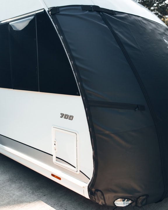 1. Custom caravan cover from Specialised Covers, designed to protect your motorhome from weather and dirt with durable, waterproof material.