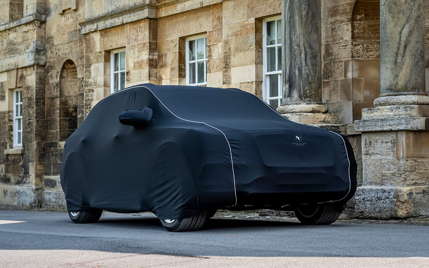 High-quality indoor car cover designed for indoor storage, protecting your vehicle from dust, scratches, and minor impacts. Custom-fit for various car models with durable, breathable material.