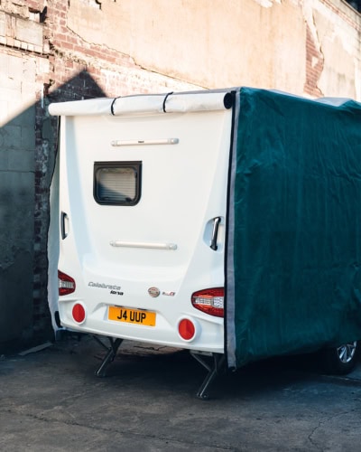 High-quality caravan cover tailored for weatherproofing and security, custom fit with durable materials for maximum durability and easy installation.