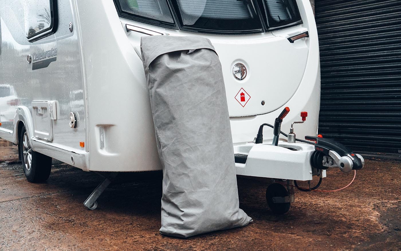 Durable caravan cover designed to protect your camper from weather and dirt, ensuring longevity and maintaining appearance. Perfect for outdoor storage and travel use.