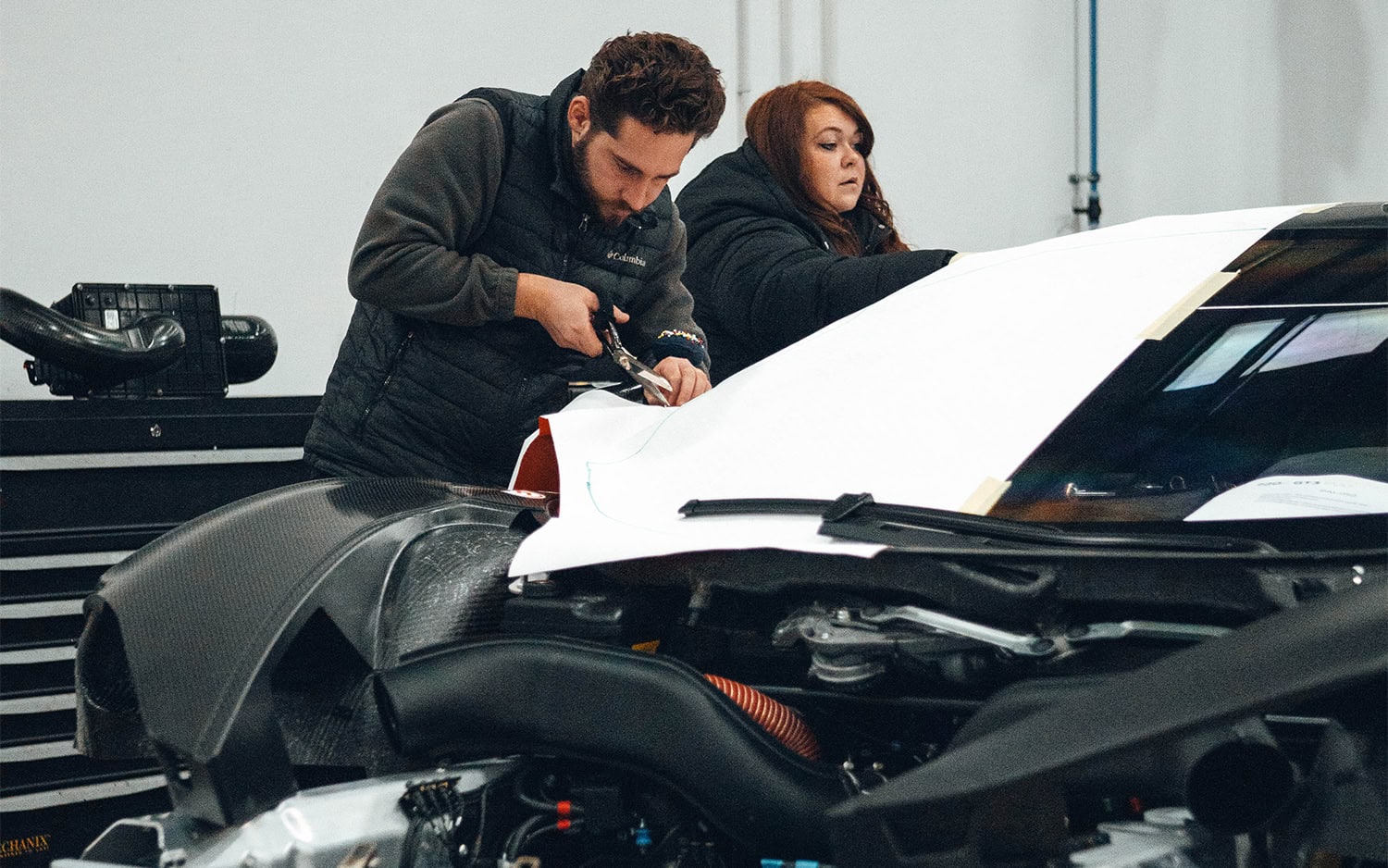 High-quality car cover for racing cars, tailored for protection and durability during motorsport events and storage.