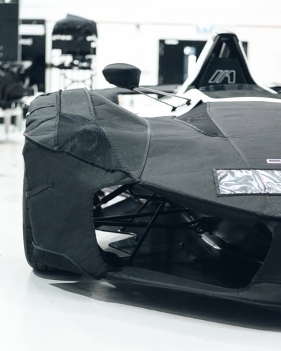 High-quality, custom-fit motorsport covers designed for race cars and track vehicles to protect from dust, weather, and damage. Durable, water-resistant, and easy to install.