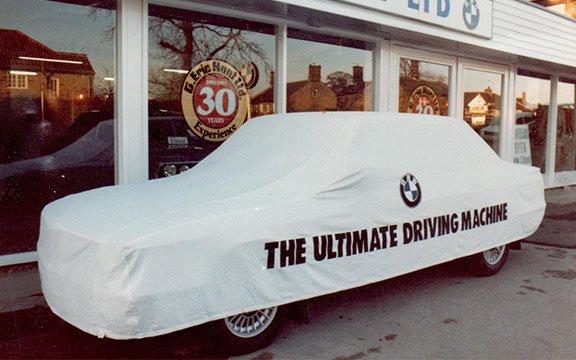 High-quality car cover designed for BMW vehicles, offering protection from elements; perfect for storing your car safely outdoors.