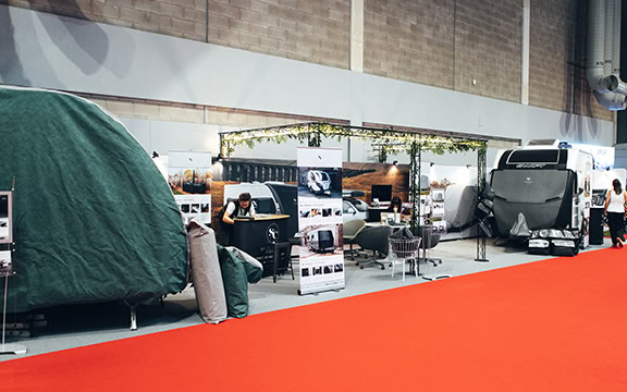 Showcasing durable caravan covers at the Caravan, Camping & Motorhome Show 2026, highlighting protection and quality for outdoor leisure vehicles.