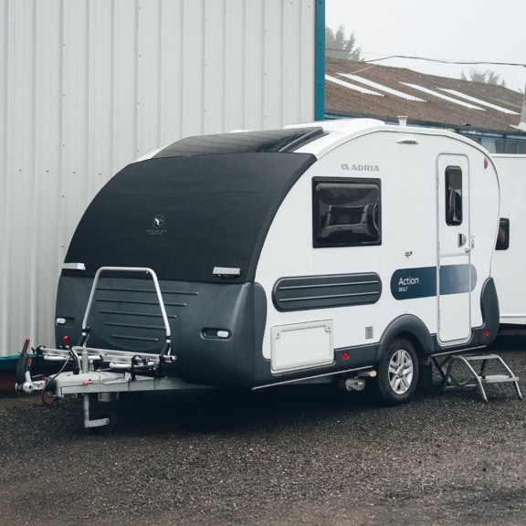 High-quality caravan cover for Adria Action Elite, providing protection against weather elements and UV damage. Custom-fit design ensures a secure and snug fit for optimal protection.