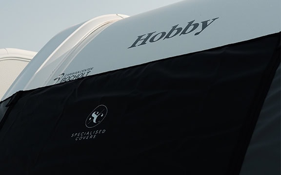 Durable caravan towing cover by Specialised Covers, designed to protect your caravan during transport across European roads, ensuring safety and longevity.