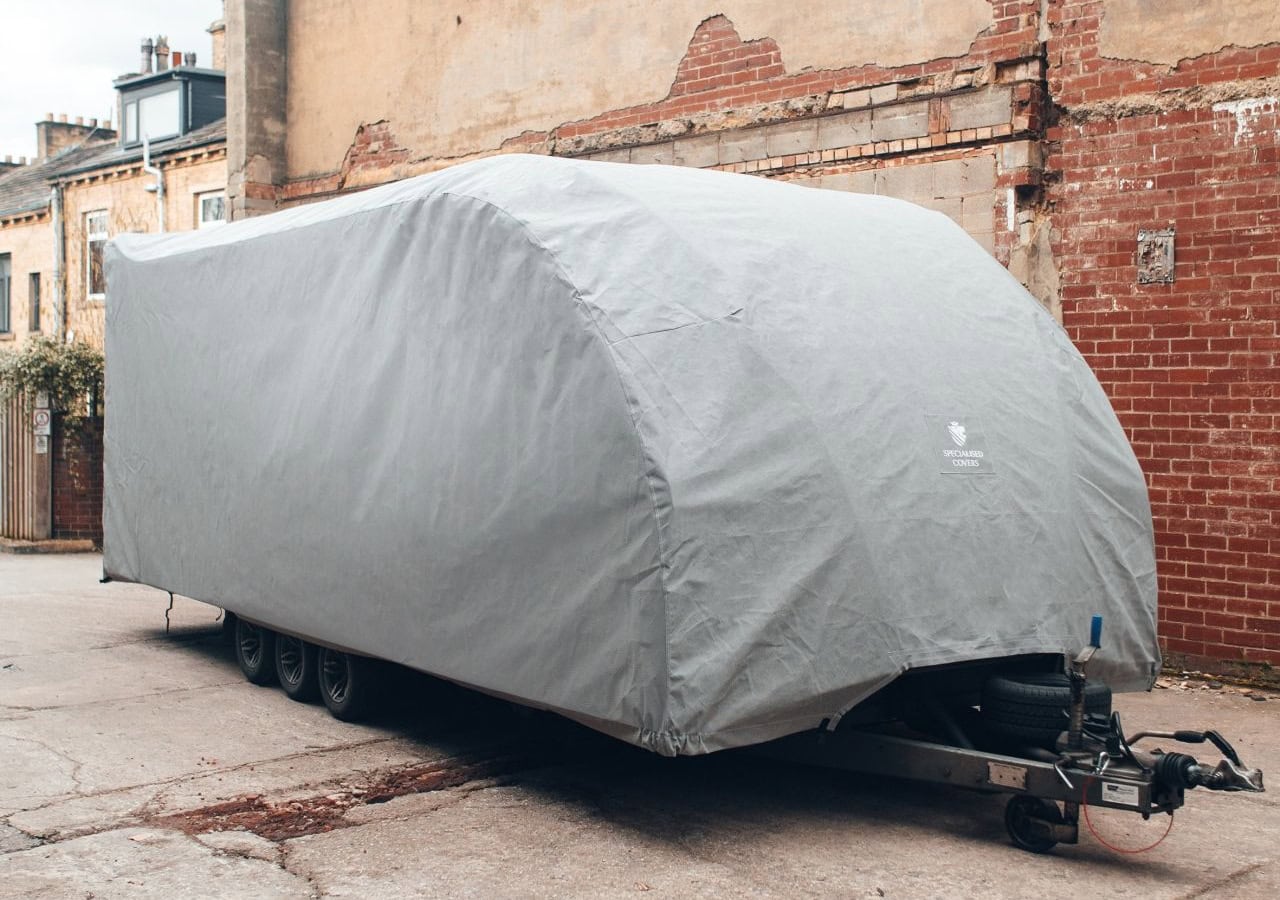 Premium transporter trailer cover for protection against weather and dirt, available from specialised covers. Custom-fit, durable, waterproof trailer covers designed to extend the lifespan of your trailer.