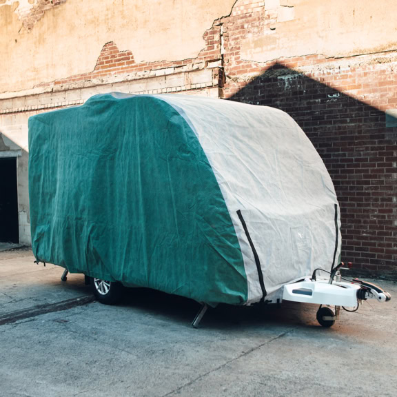 Highly durable caravan cover to safeguard your vehicle from weather elements, dust, and dirt. Perfect for outdoor storage, ensuring your caravan stays in pristine condition during off-season or long-term parking.