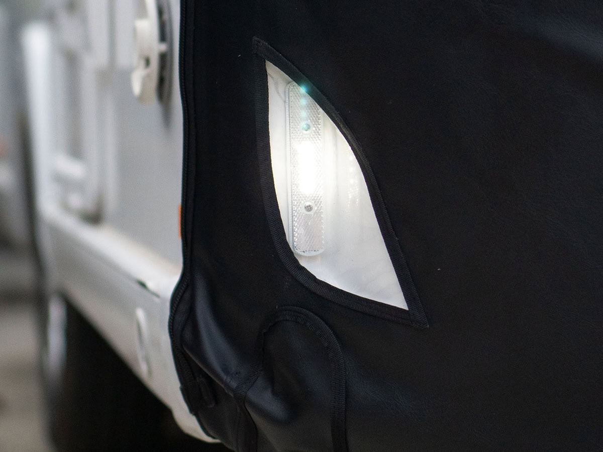 High-quality vehicle cover protection for Tow Pro trailers, durable waterproof fabric, tailored fit, UV resistant, ideal for outdoor storage, secure and easy to install.