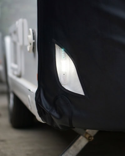 High-quality vehicle cover protection for Tow Pro trailers, durable waterproof fabric, tailored fit, UV resistant, ideal for outdoor storage, secure and easy to install.
