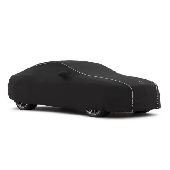 Stylish black car cover designed for indoor use, offering excellent protection from dust, dirt, and scratches for your vehicle. Made with durable, snug fit material to ensure optimal coverage indoors.