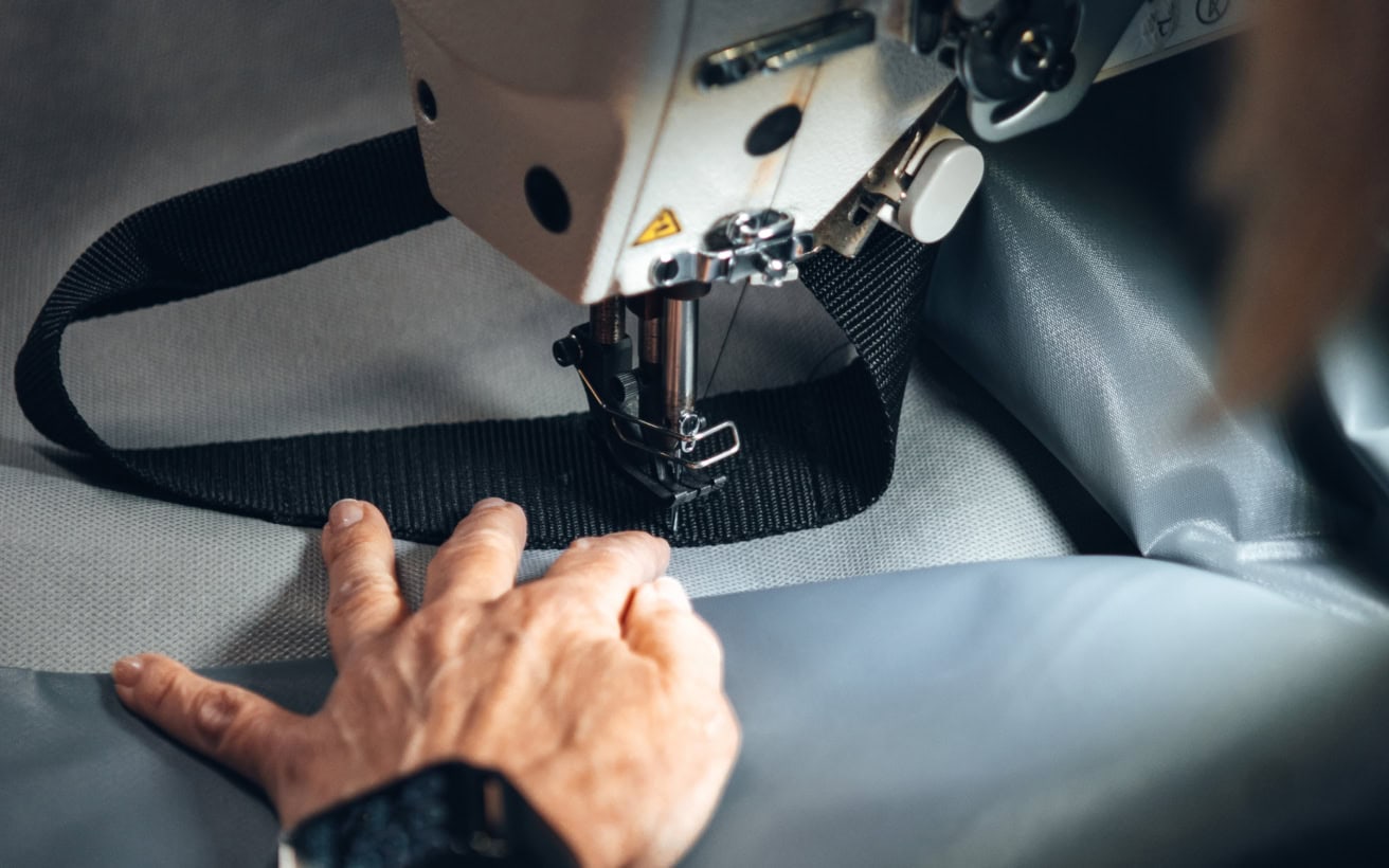 High-quality fabric used in bespoke vehicle and equipment covers by Specialised Covers. Designed for durability and weather resistance, perfect for protecting assets.