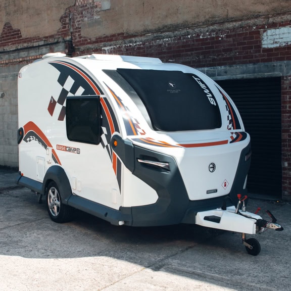 Caravan with customised weather-resistant cover from Specialised Covers, providing full protection against the elements. Designed for durability, ideal for caravan owners looking for tailored, high-quality covers for outdoor camping.
