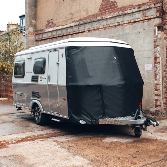 Caravan cover designed specifically for Eriba Touring Tow Pro+ caravans, offering protection against weather, UV rays, and dirt. Durable, water-resistant material with easy installation for outdoor storage.
