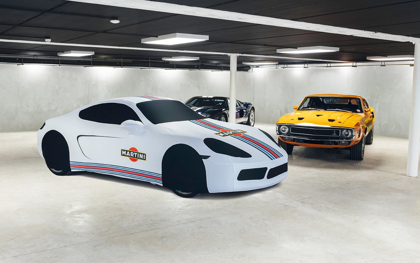 A custom printed Martini Livery cover on a Porsche.