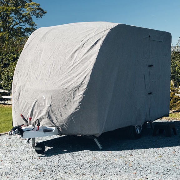 A tailored fitting grey Caravan Cover on a Caravan.