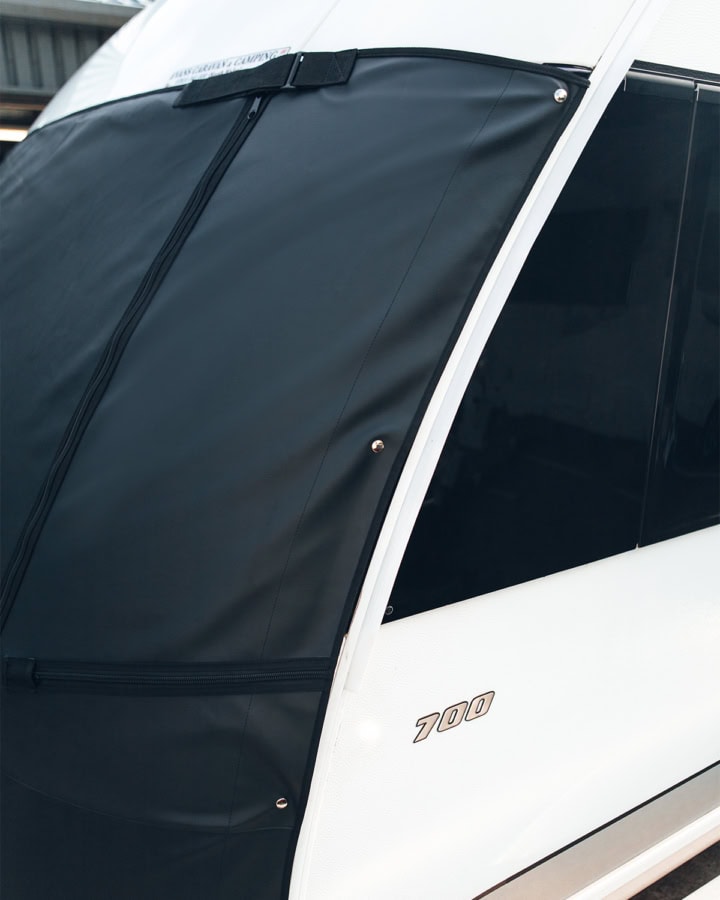 Waterproof boat cover for protection against the elements, custom-fit for boats, durable marine-grade material, UV resistant, easy to install, designed to prevent damage to boat surfaces.