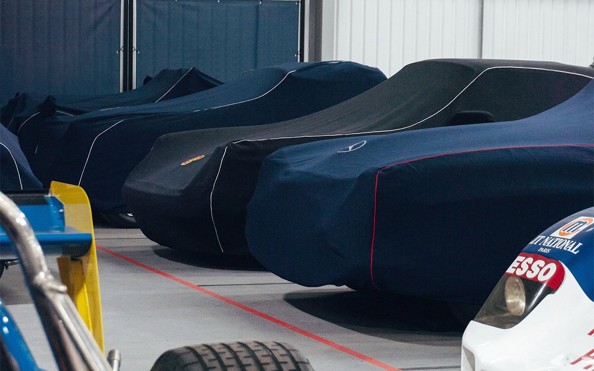 High-quality indoor car covers designed to shield vehicles from dust, dirt, and potential damage in garages or showrooms. Perfect for car enthusiasts and collectors.