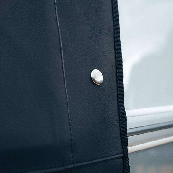 Durable black custom-fit cover designed to protect the Eriba Touring Tow Pro + caravan from weather, dirt, and UV damage. Easy to install with secure fastening for optimal coverage and durability.
