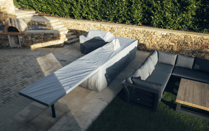 High-quality outdoor kitchen storage cover protecting BBQs and appliances from weather damage for maximum durability.