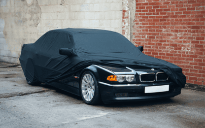 High-quality outdoor car cover for BMW, weather-resistant and durable, offering excellent protection against dirt, rain, and UV rays for vehicle safety outdoors.
