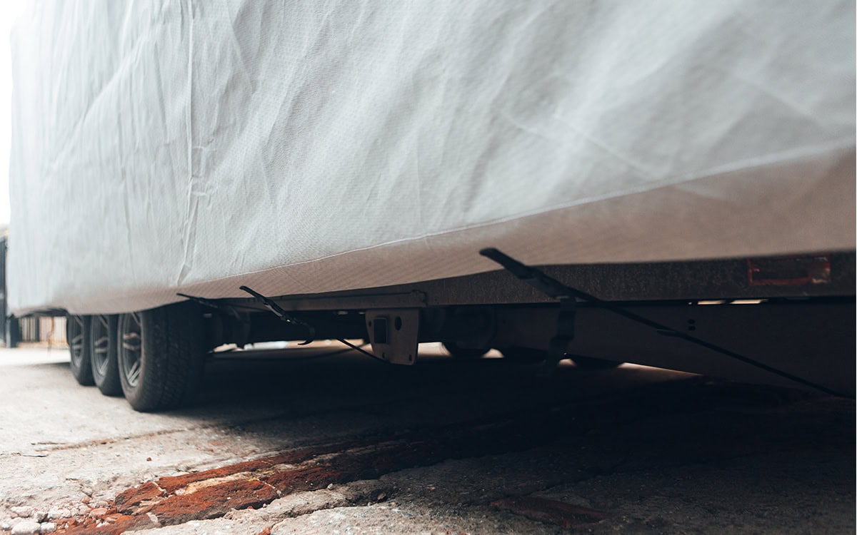 Durable custom-made transporter trailer cover for vehicle protection and weather resistance, designed by Specialised Covers, ensuring superior fit and material quality.