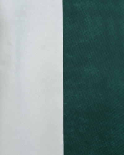A close up image of the Specialised Covers torrent fabric in Green and Grey.