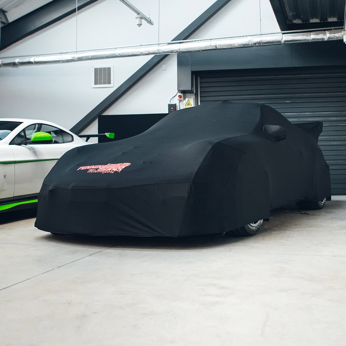 Protects high-performance vehicles from dust and damage with custom waterproof covers.