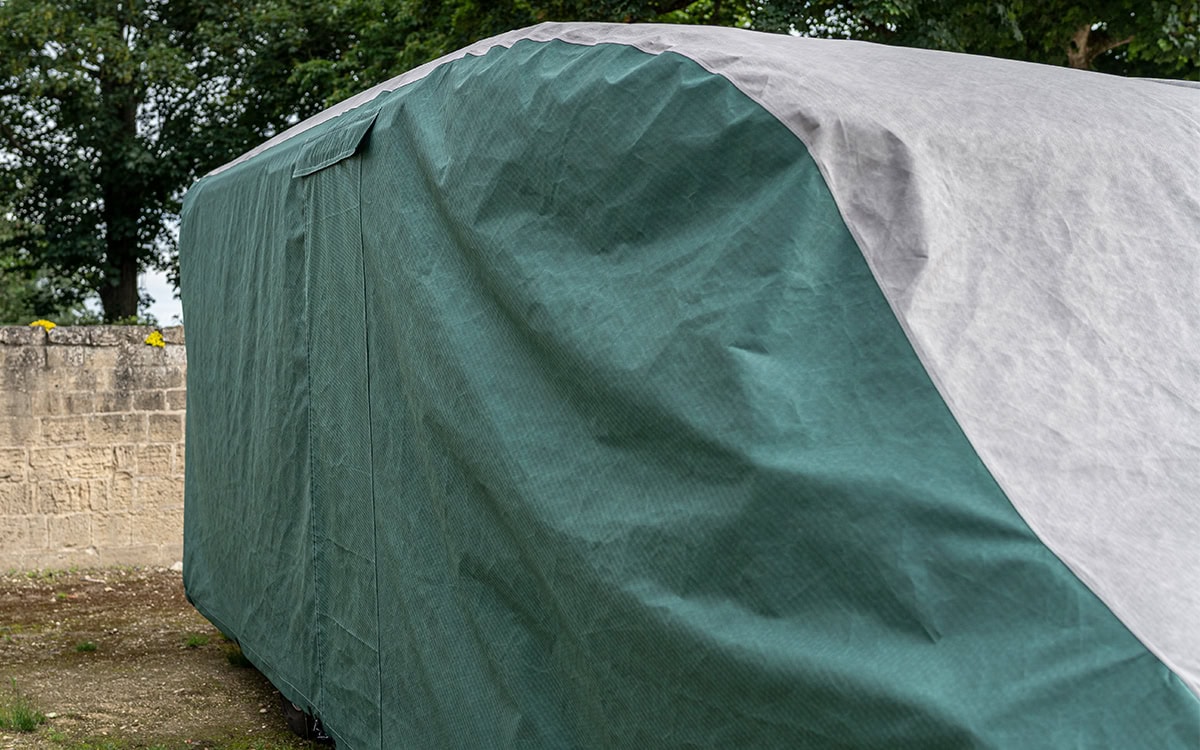 High-quality, weather-resistant motorhome cover designed for outdoor protection and durability. Fits various sizes, offering full coverage to protect against rain, UV rays, and dirt.