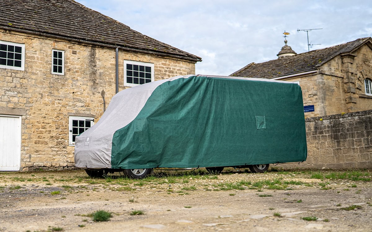 Durable waterproof motorhome cover protects vehicles from weather damage. Custom fit size ensures perfect coverage for outdoor storage and protection.