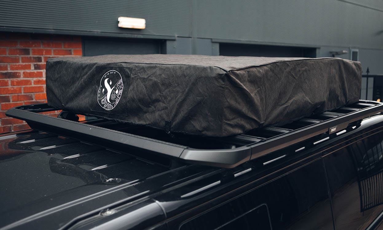 High-quality waterproof cargo cover for vehicle roof racks, designed to protect luggage from weather and theft, available from Specialised Covers.