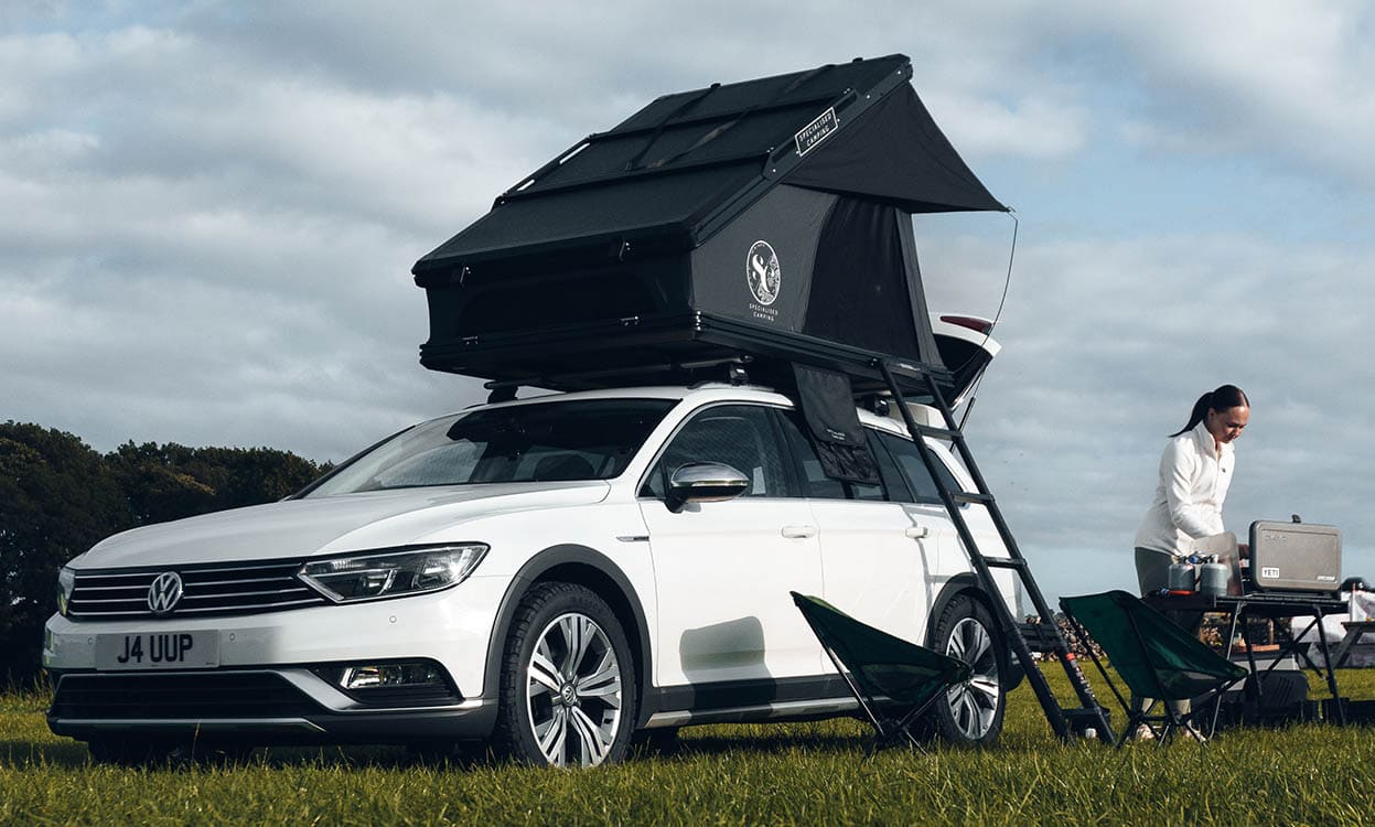 High-quality car roof tent mounted on a Volkswagen, ideal for camping adventures. Durable, easy to install, and perfect for outdoor leisure, offering comfort and convenience for mobile explorers.