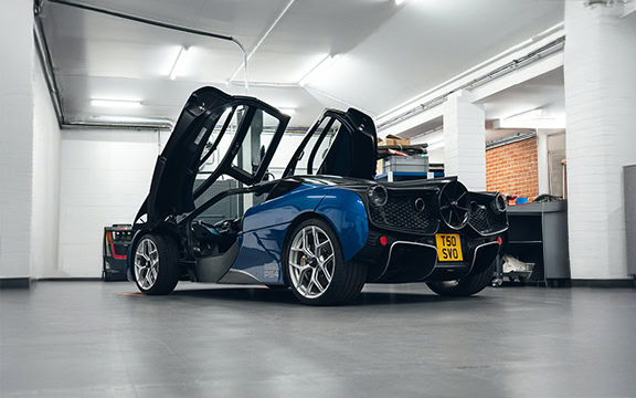 Durable, custom-fit cover designed for high-end automotive display and protection. Fits Gordon Murray Automotive car, ensuring security and preservation in a climate-controlled environment.