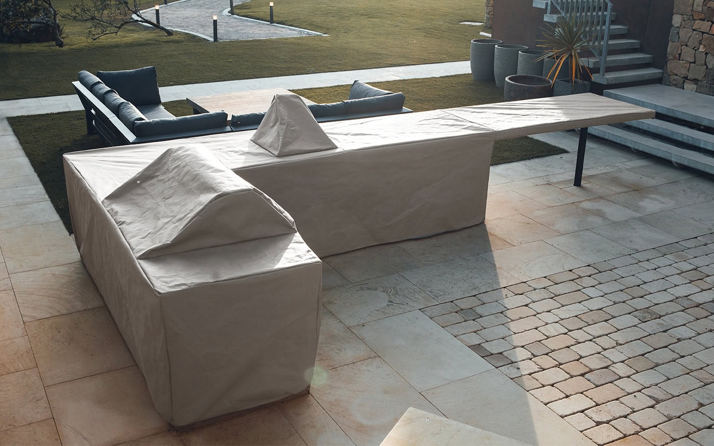 Weatherproof protective kitchen cover for outdoor furniture, ideal for safeguarding against rain, sun, and dirt. Custom-made to fit various kitchen setups, ensuring durability and long-lasting protection.