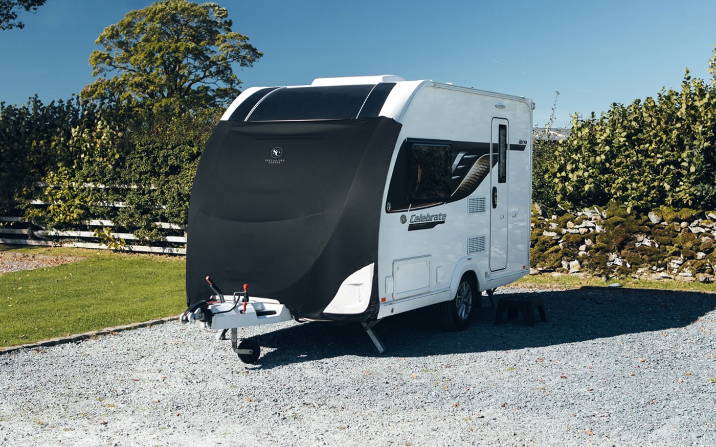 Protective caravan cover for outdoor storage to safeguard your camper from weather damage and dirt. Custom-fit waterproof and UV-resistant covers available for various caravan sizes.