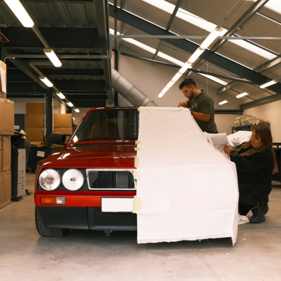 High-quality bespoke car cover tailored for a Lancia Delta S4 Stradale, showcasing expert craftsmanship and protection for rare vehicles.