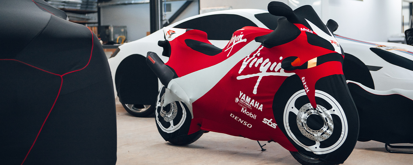 Premium motorcycle cover designed for racing bikes, offering superior protection against weather and dust. Custom-fit for Yamaha and other high-performance motorcycles.