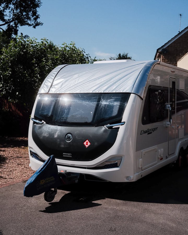 Custom caravan cover by Specialised Covers protecting a Challenger caravan from weather elements.